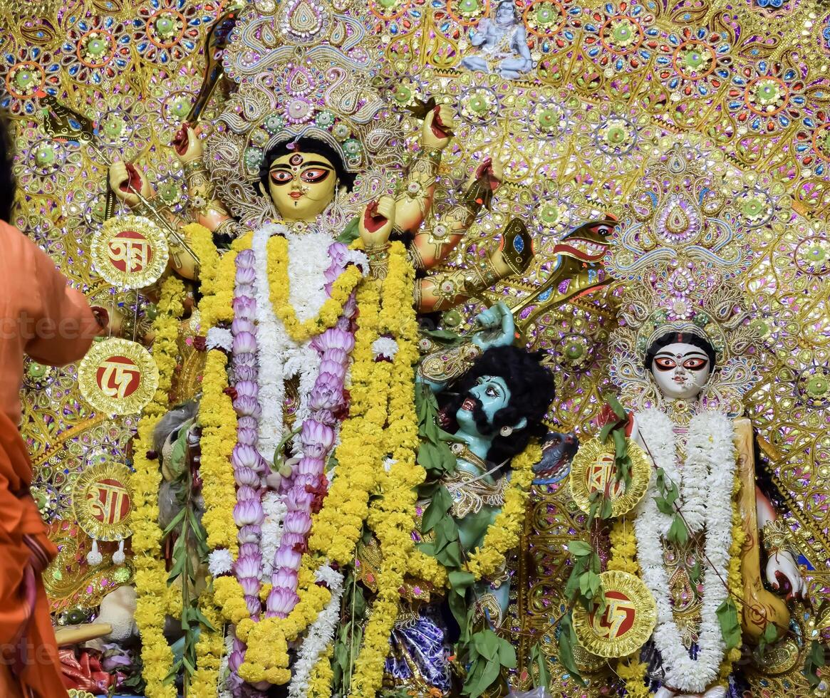 Goddess Durga with traditional look in close up view at a South Kolkata Durga Puja, Durga Puja Idol, A biggest Hindu Navratri festival in India photo