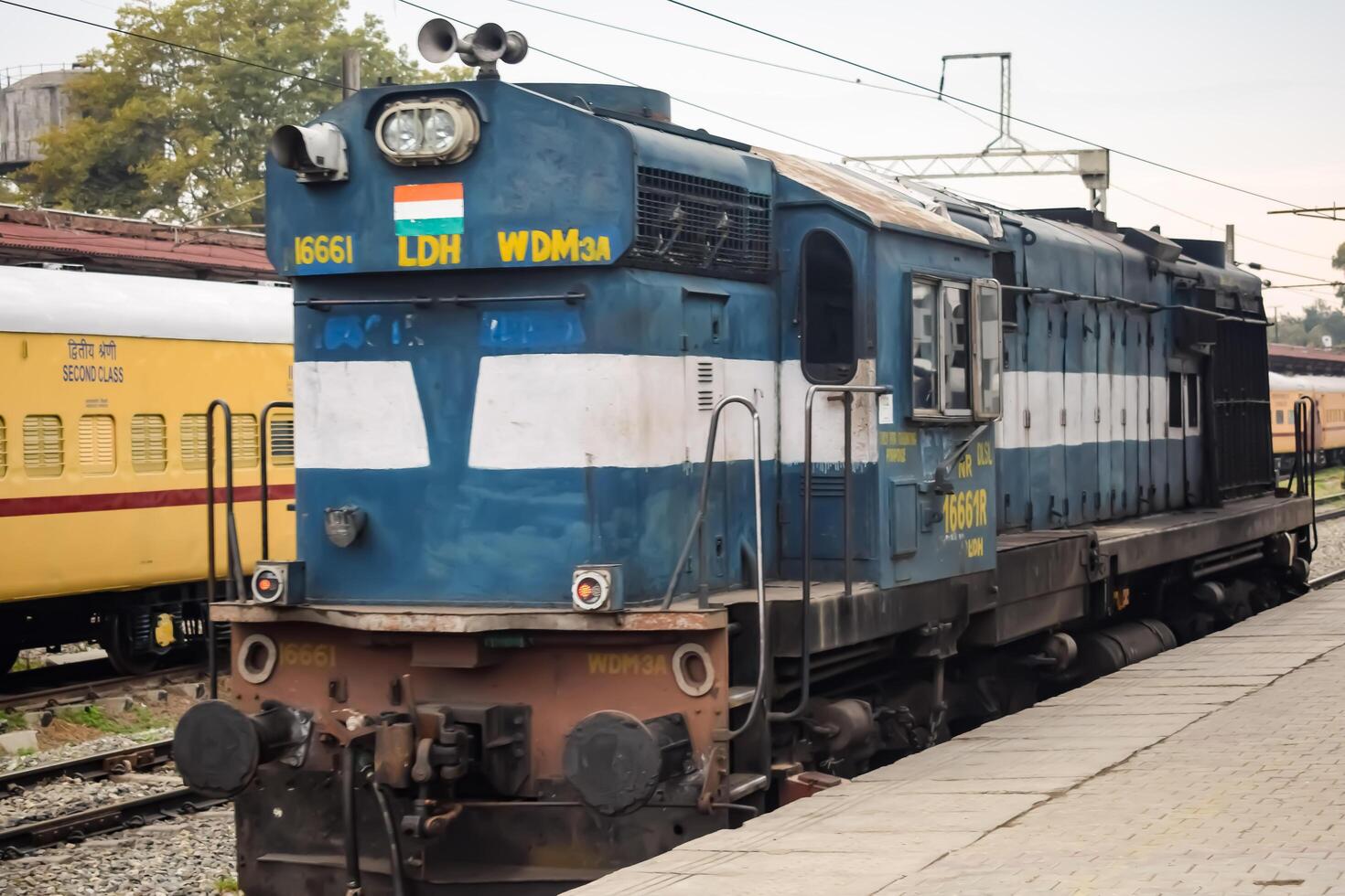 Amritsar, India, February 03 2024 - Indian train electric locomotive engine at Amritsar railway station during the day time, Amritsar Shatabdi train electrical locomotive engine photo