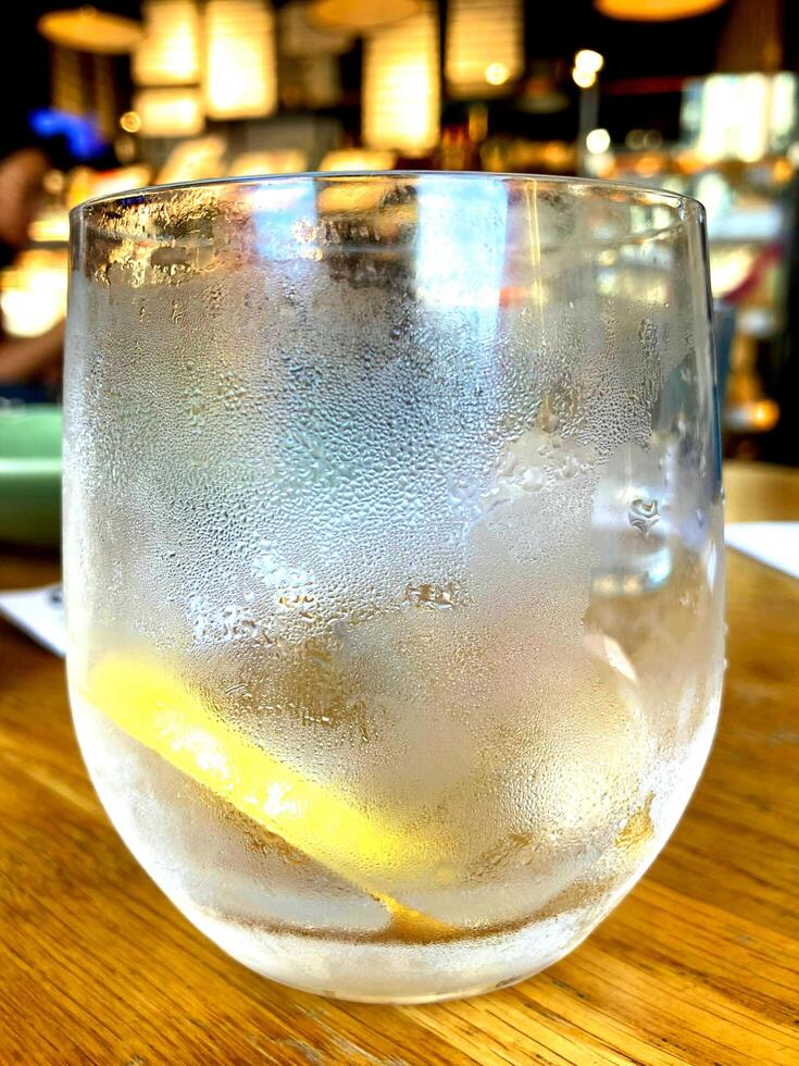 soft drink being poured into glass photo