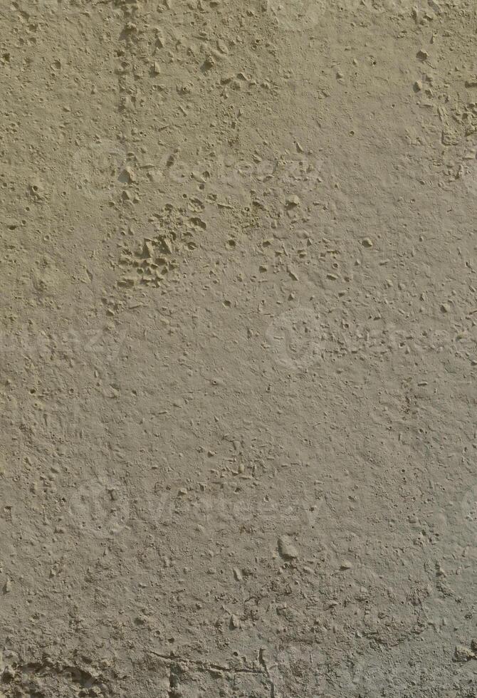 Texture of the old embossed concrete wall in gray color. Background image of a concrete product photo