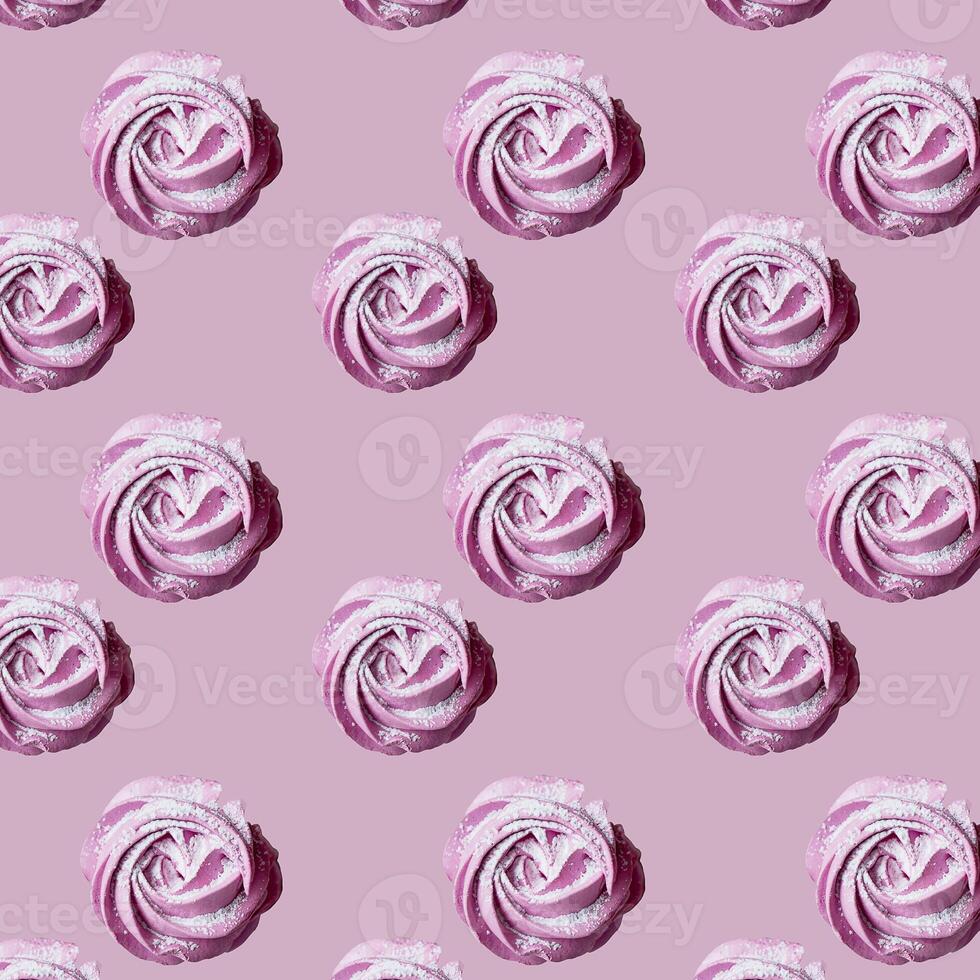 Pattern with Bizet cakes.Pink color, powdered sugar. The view from the top photo