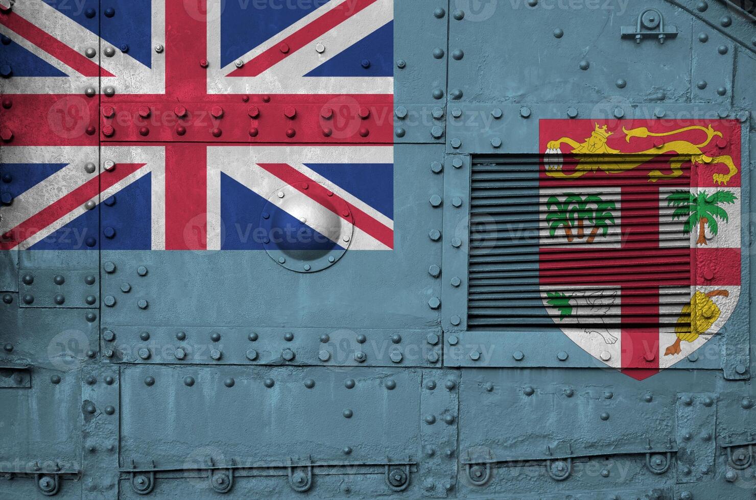 Fiji flag depicted on side part of military armored tank closeup. Army forces conceptual background photo