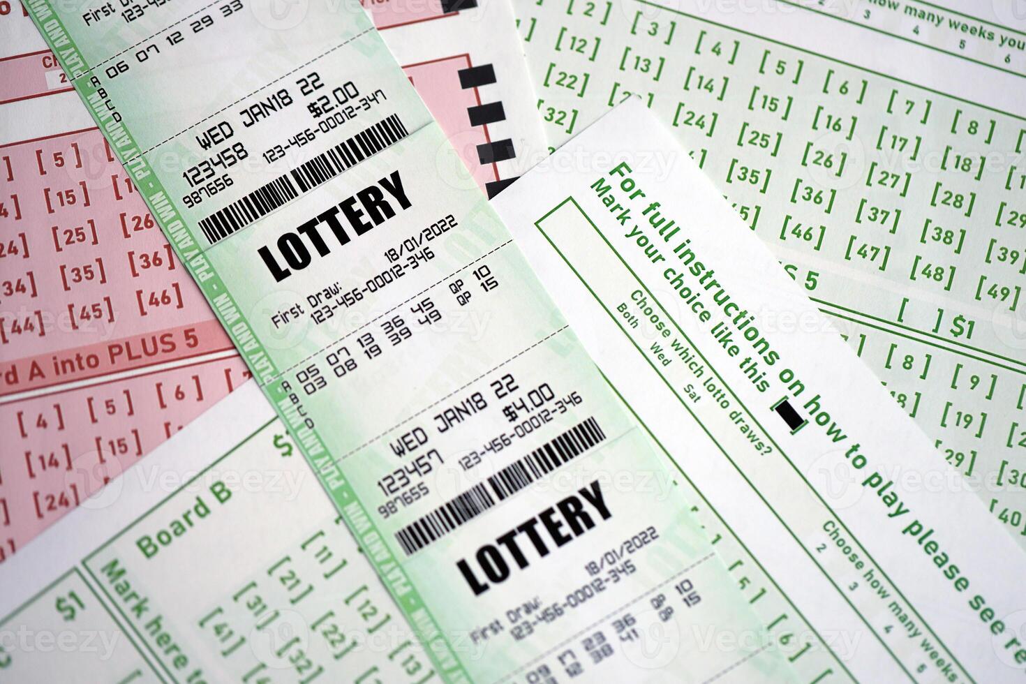 Green and red lottery tickets on blank bills with numbers for playing lottery photo
