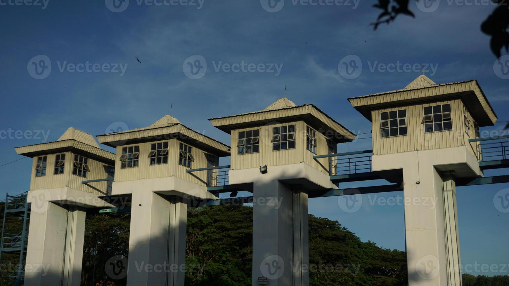 The sluice control building at a dam photo