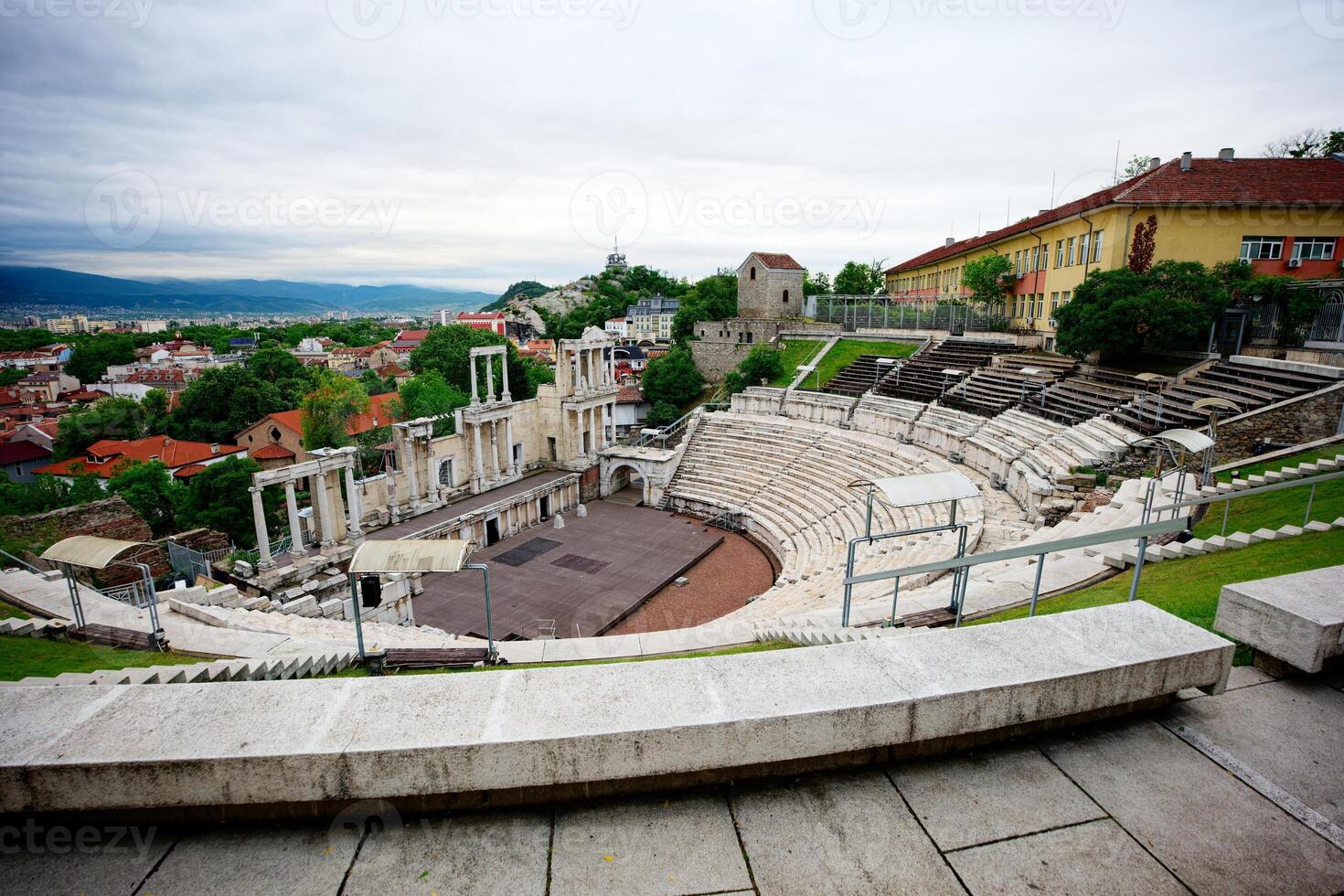View of the Ancient Theatre of Philippopolis in Plovdiv, Bulgaria. Archaeological site and one of the best preserved ancient roman theaters in the world. photo