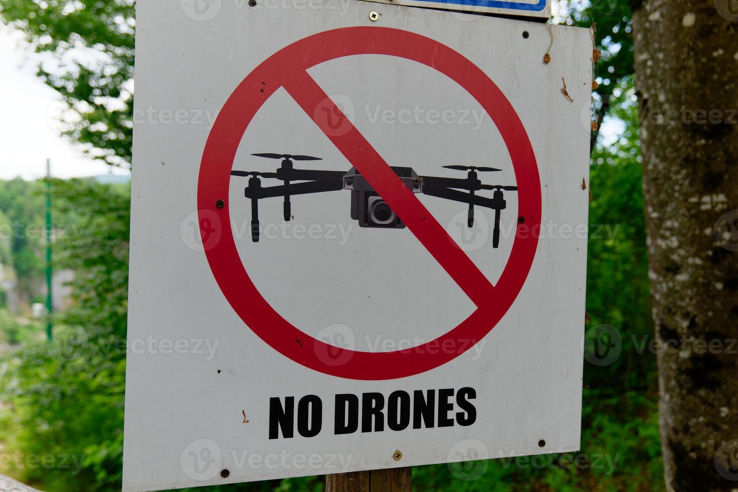 No drones sign. Forbidden to fly drones in the area. No flying controlled robots. photo