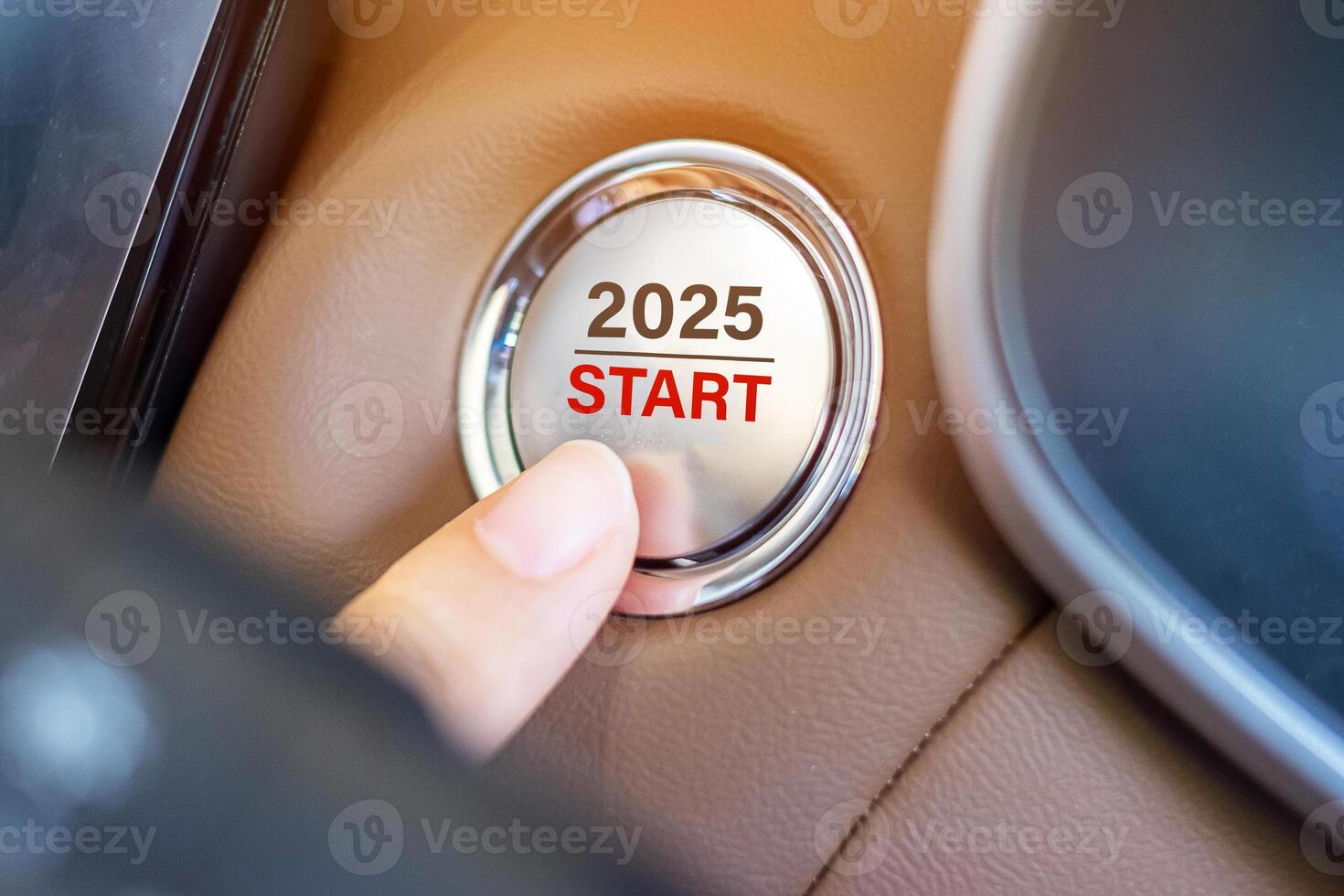 Finger press a car ignition button with 2025 START text inside automobile. New Year New You, forecast, resolution, motivation, change, goal, vision, innovation and planning concept photo