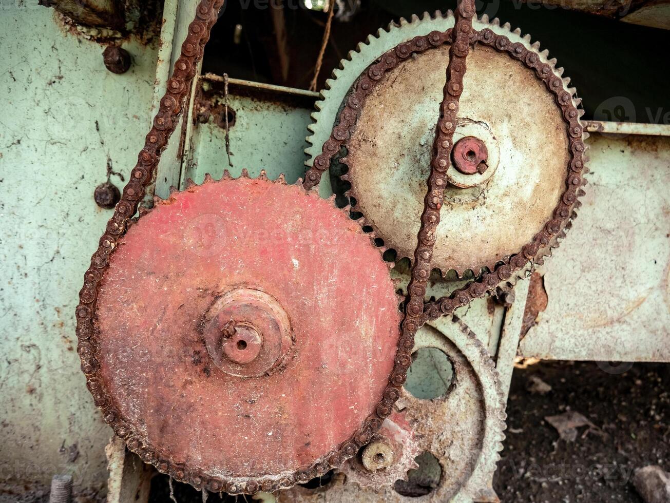 gear mechanism on old agricultural machines with a chain as a connection photo