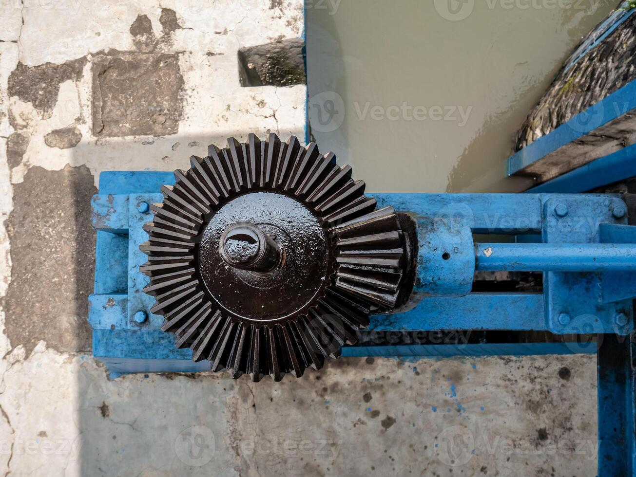 gear look from above with thin, black and shiny oil photo