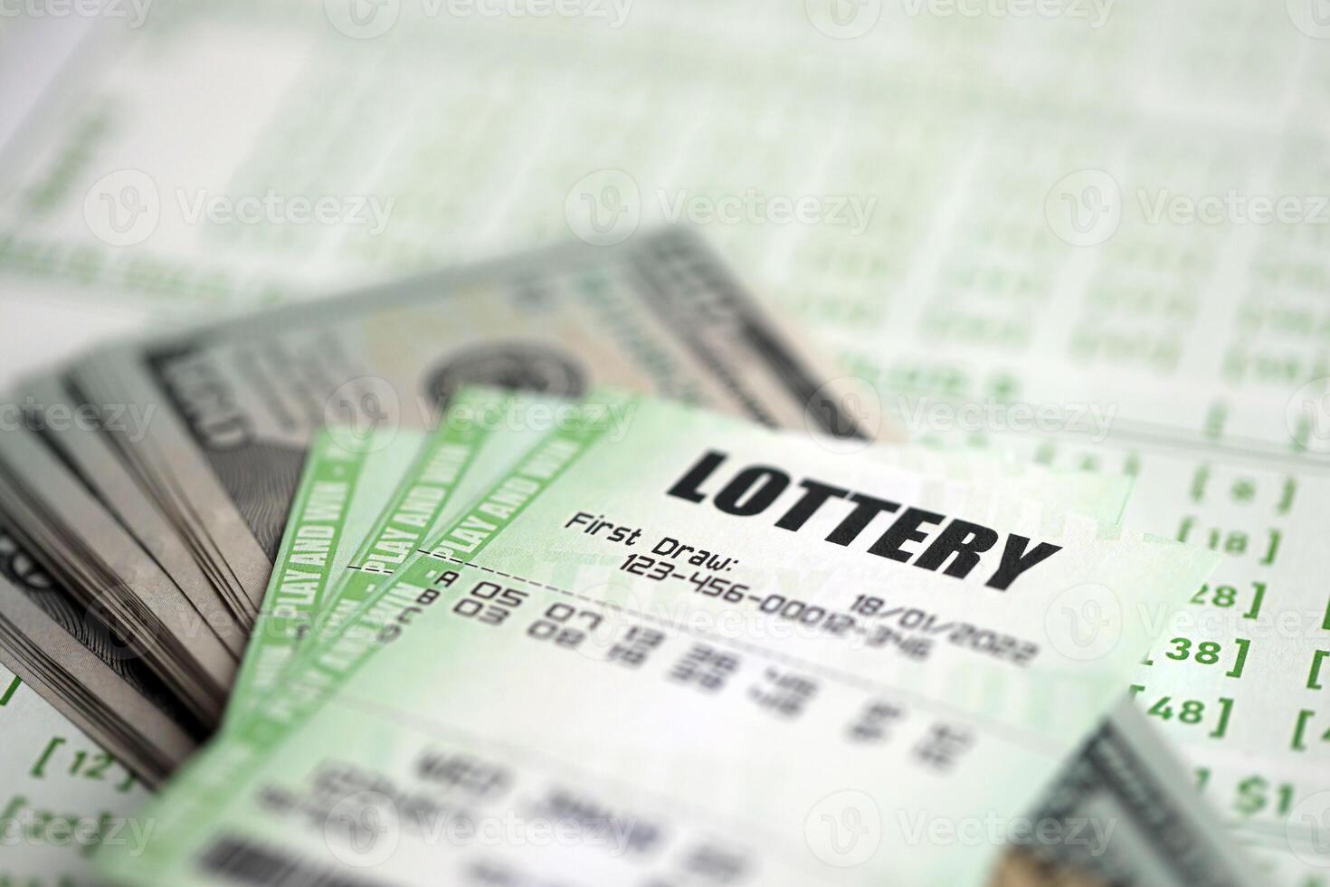 Green lottery tickets and US money bills on blank with numbers for playing lottery photo