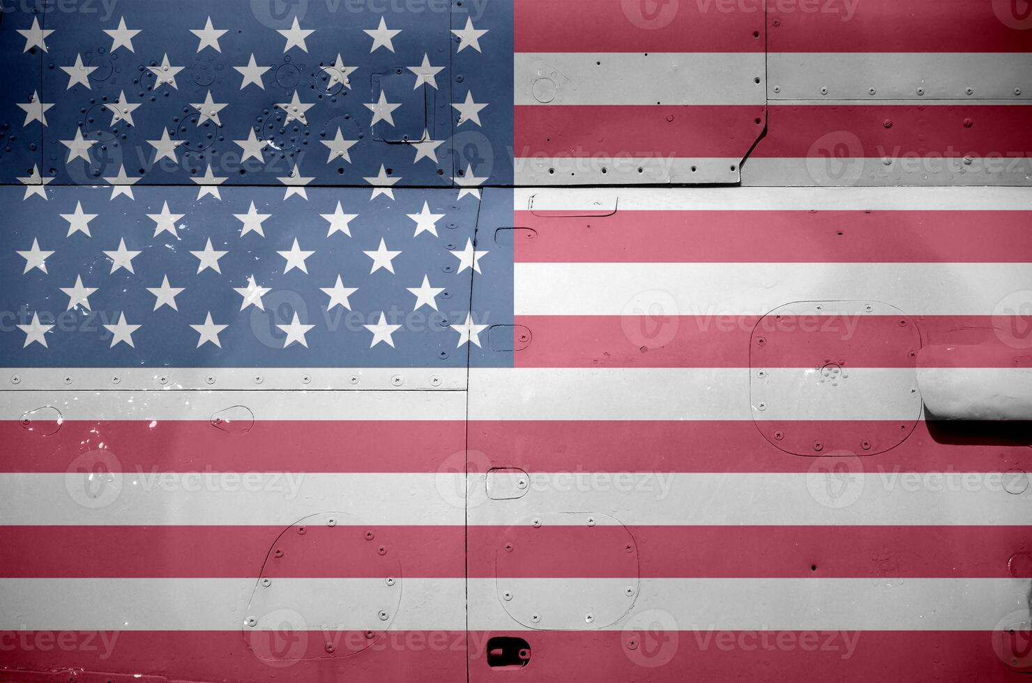 United States of America flag depicted on side part of military armored helicopter closeup. Army forces aircraft conceptual background photo