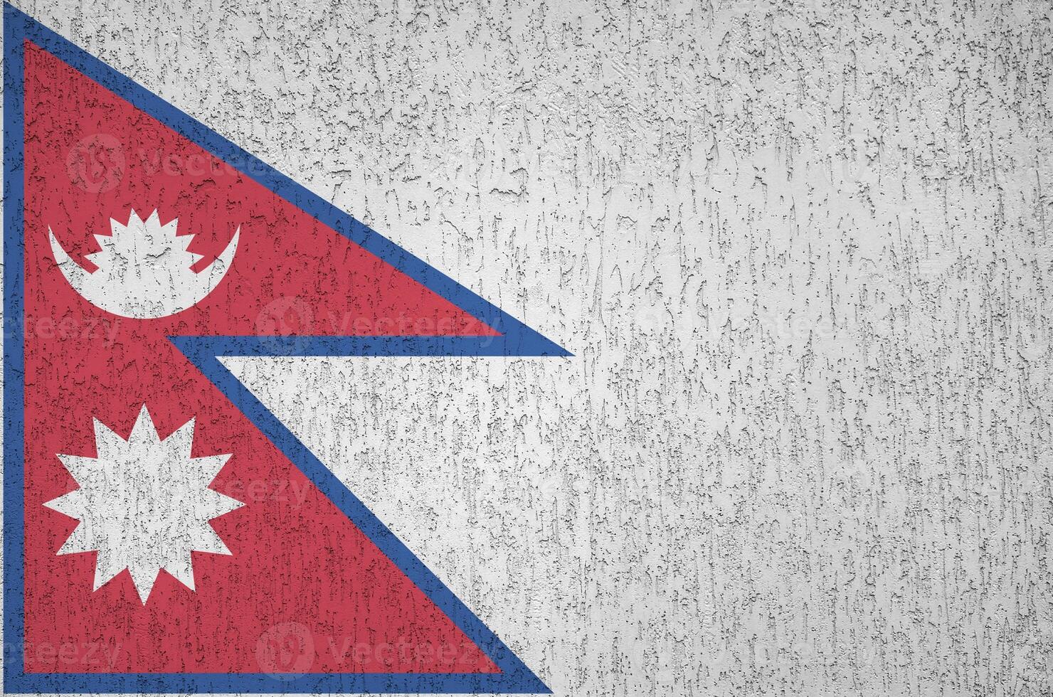 Nepal flag depicted in bright paint colors on old relief plastering wall. Textured banner on rough background photo