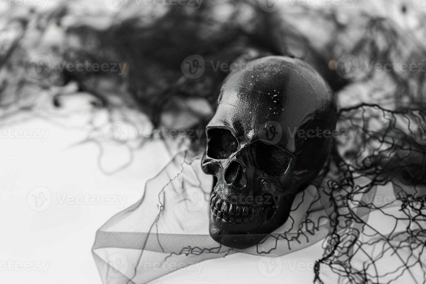 Eerie Halloween scene captures a sinister black skull enveloped in tangled cobwebs, creating a chilling atmosphere, ideal for spooky themed content with a stark, moody background. photo