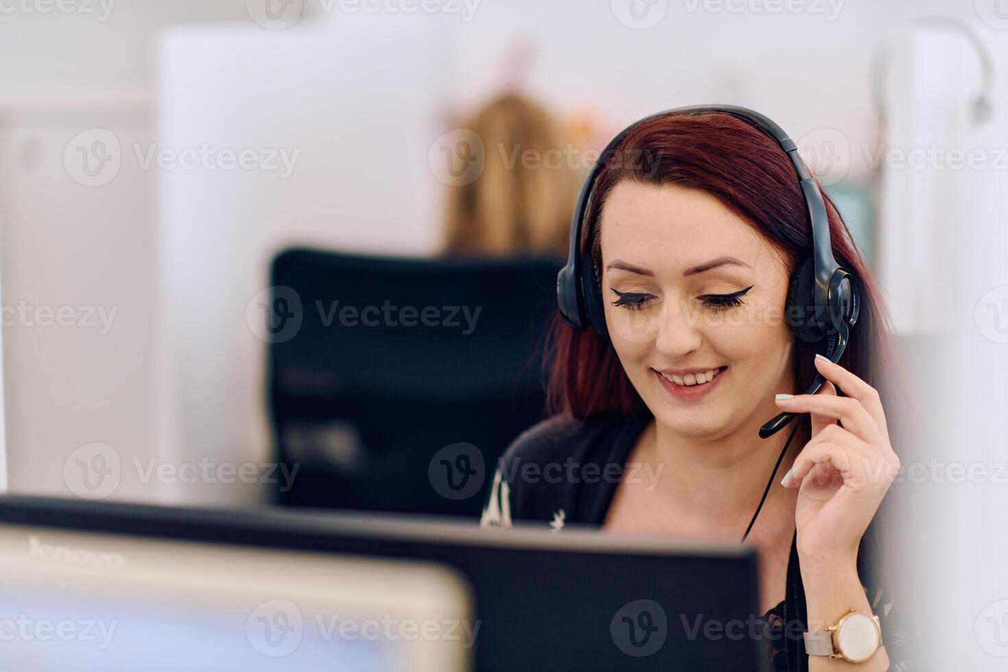 Friendly Call Center Agent Answering Incoming Calls with Headset Providing Remote Customer Service. photo