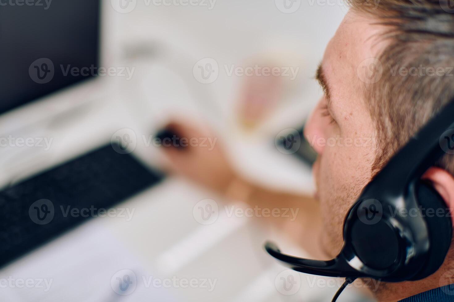 Close Up Portrait of a Customer Support Representative in a Call Center Environment. photo