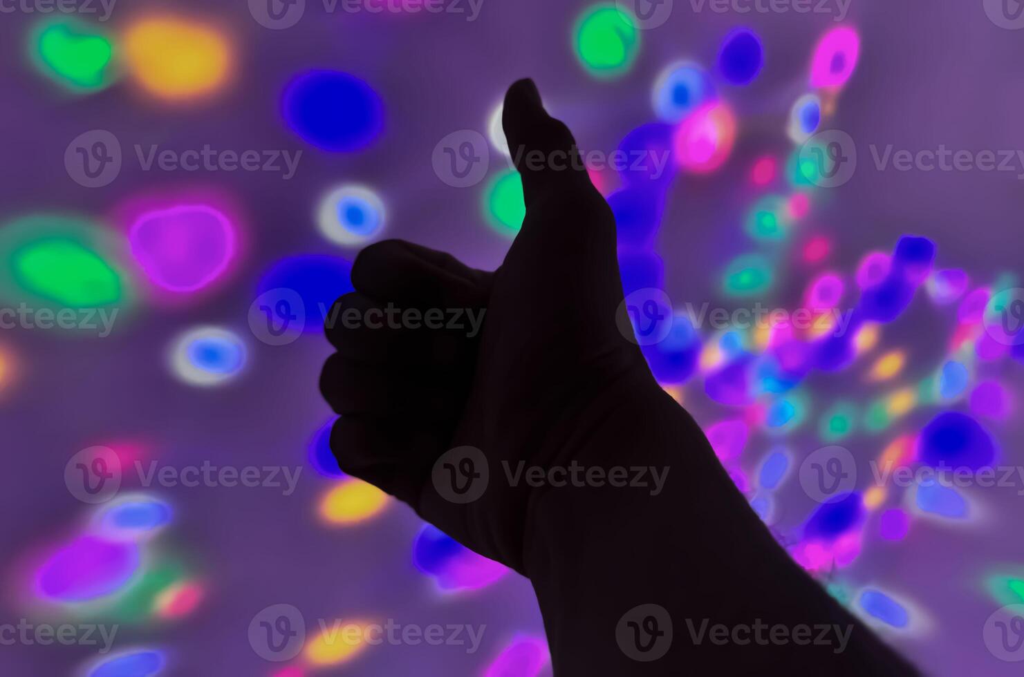 Hand gesture silhouette on a colorful background reaching out, saying hello, and show number represent photo