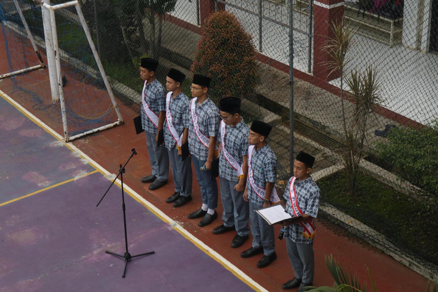 Subang, Indonesia - May 2024, Ceremonial officers during activities to commemorate National Education Day in the school field photo