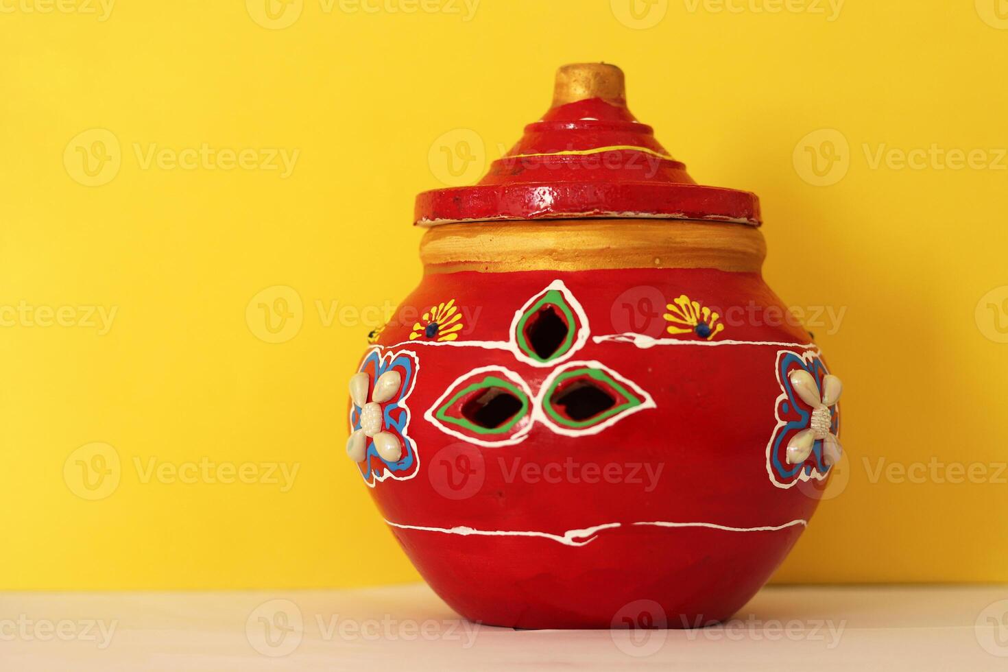 Navratri Festival earthen clay pot. known as Garba is worshipped religiously. also lighting up a diya and place inside the pot. popular festival specially in Gujarat. photo
