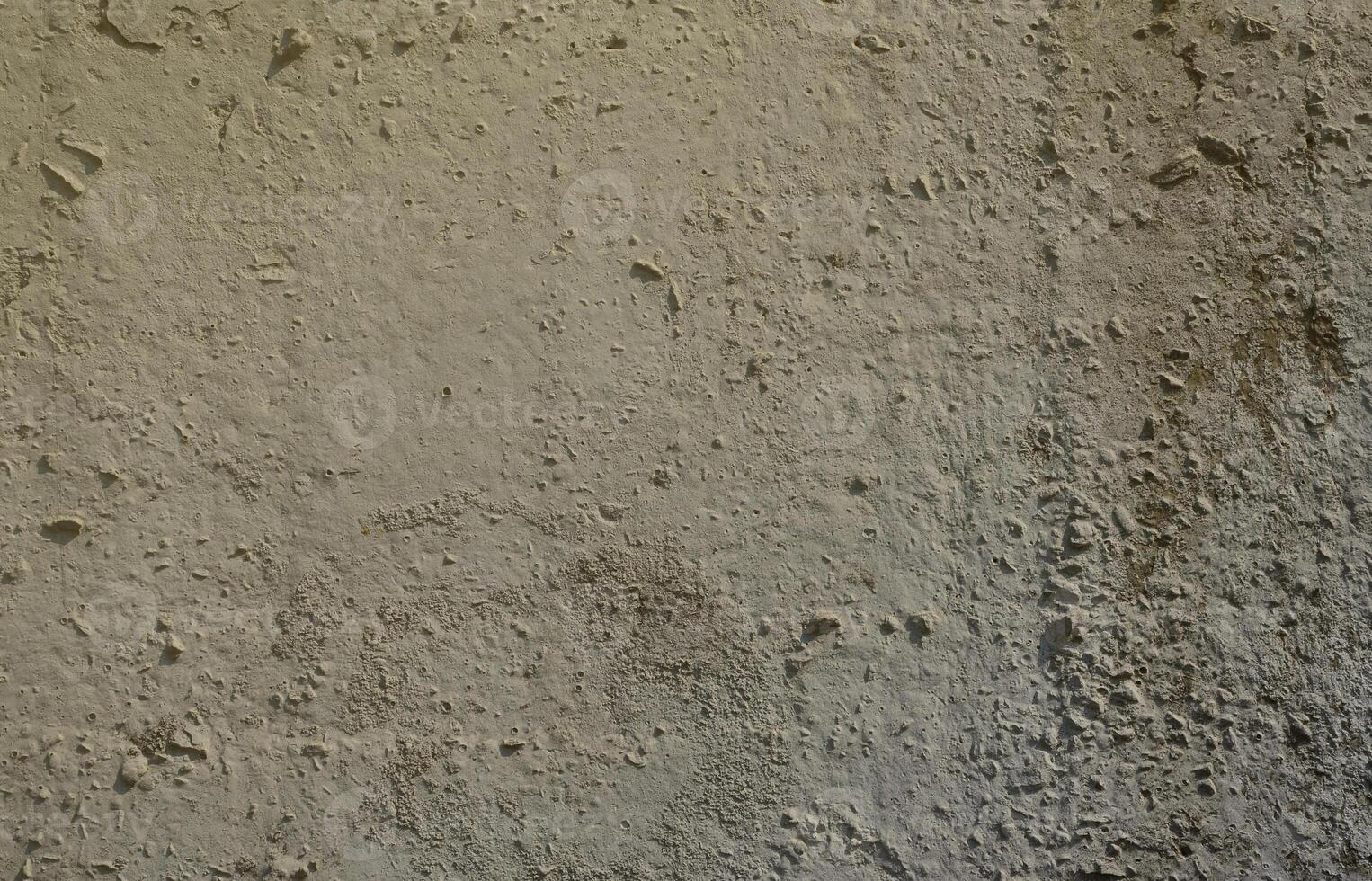 Texture of the old embossed concrete wall in gray color. Background image of a concrete product photo