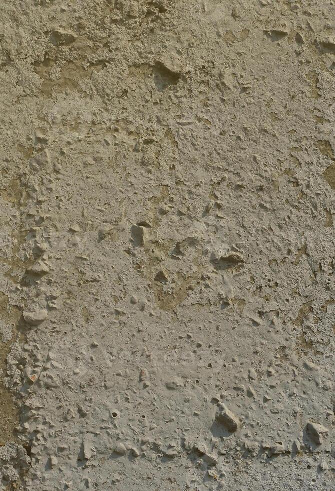 Texture of the old embossed concrete wall in gray color. Background image of a concrete product photo