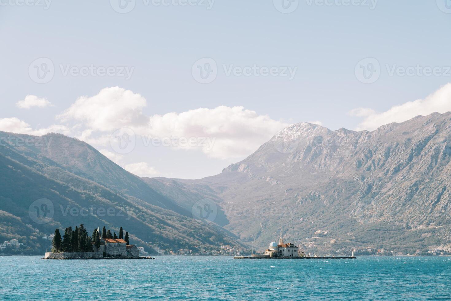 Islands of St. George and Gospa od Skrpjela in the Bay of Kotor with the mountains in the background. Montenegro photo