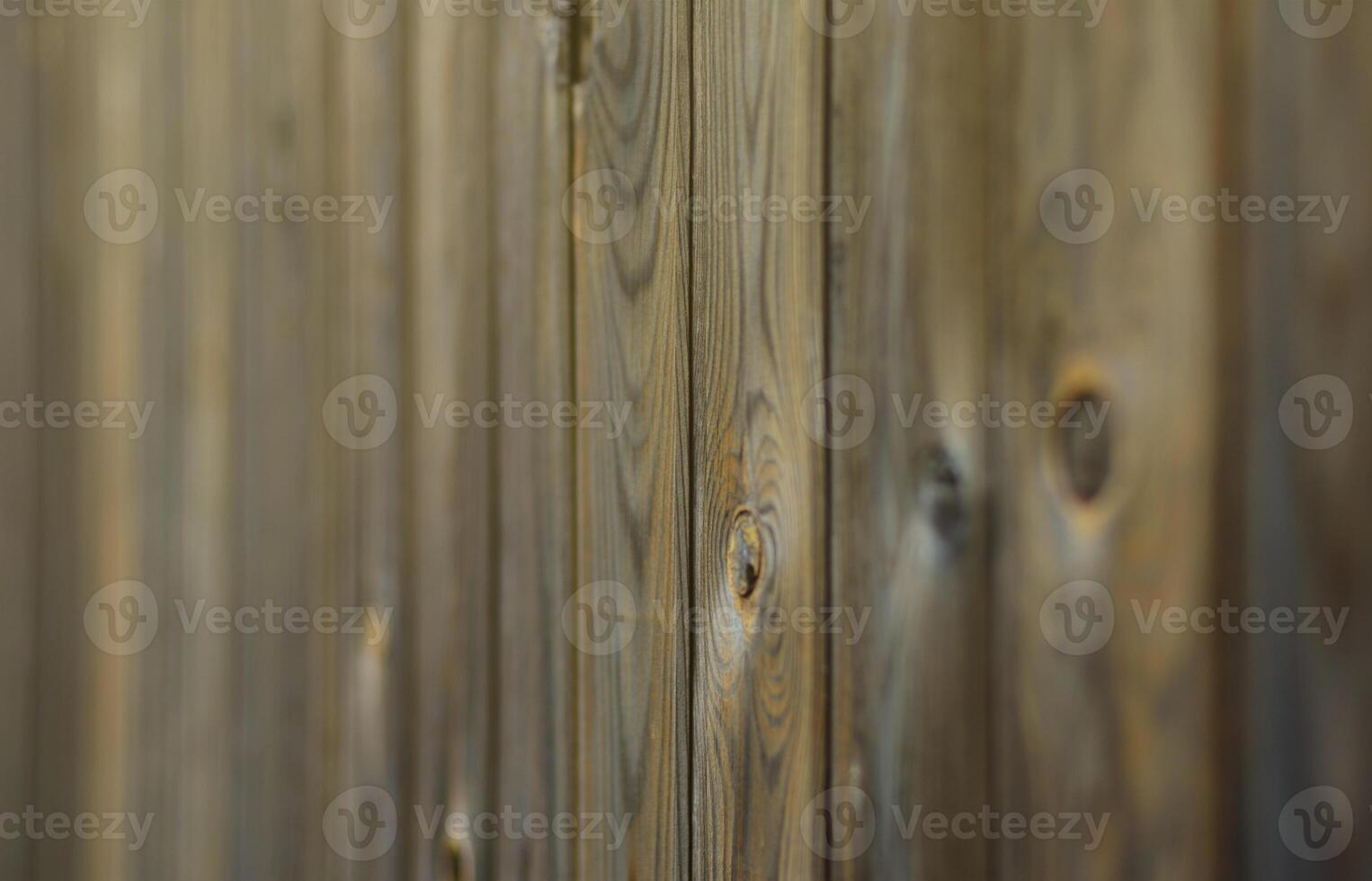 Old grunge dark brown wood panel pattern with beautiful abstract grain surface texture, vertical striped background or backdrop in architectural material decoration concepts, vintage or retro style photo