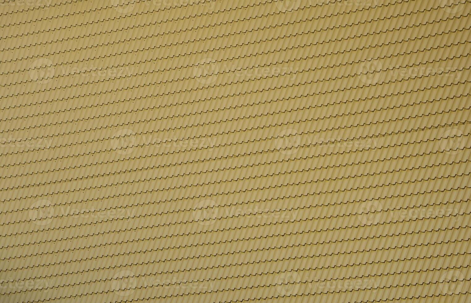 The texture of the roof of painted metal. Close-up detailed view of roof covering for pitched roof. High quality roofing photo