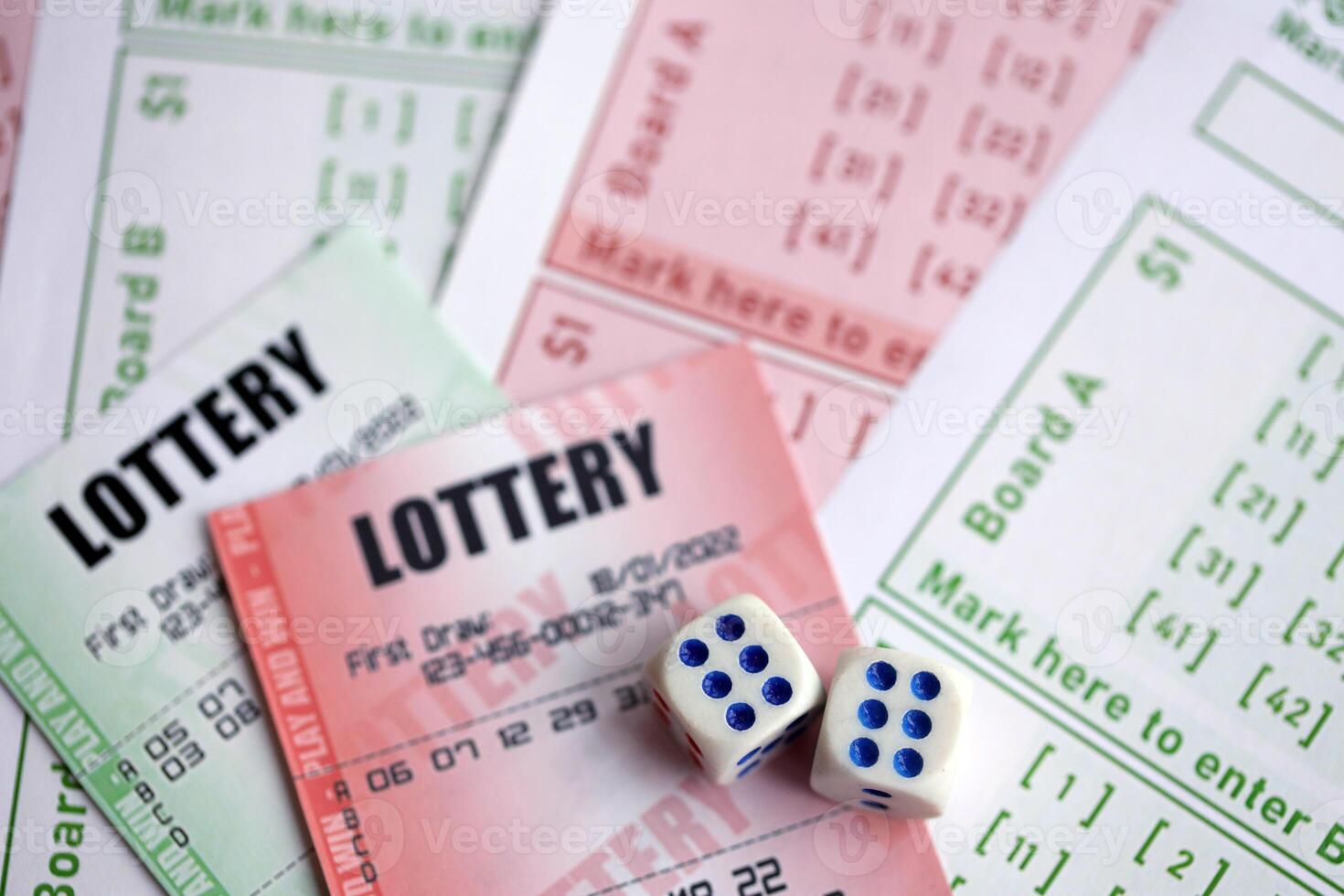 Green and red lottery tickets with dice on blank bills with numbers for playing lottery photo