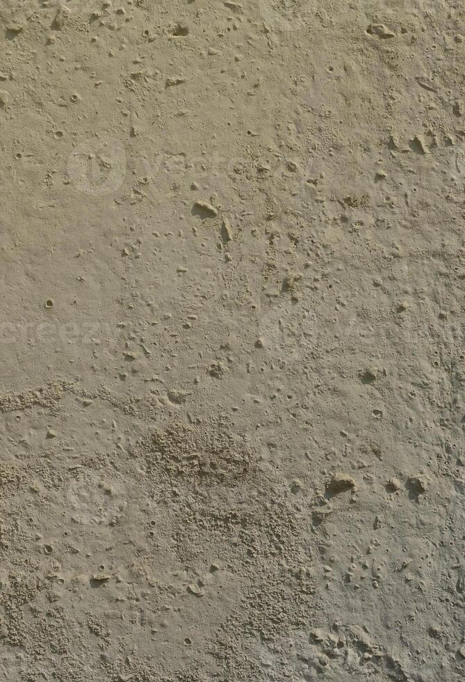 Texture of the old embossed concrete wall in gray color. Background image of a concrete product photo