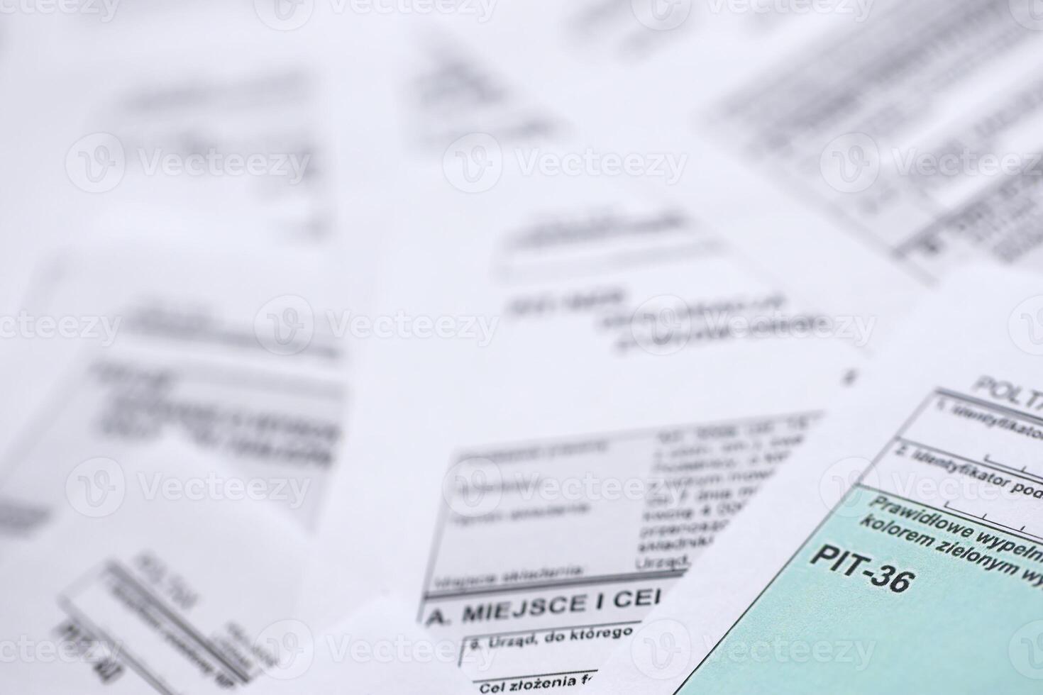 Very big amount of polish tax form blanks with PIT, CIT and VAT categories. Accounting, bureaucracy and taxpayers routine in Poland photo
