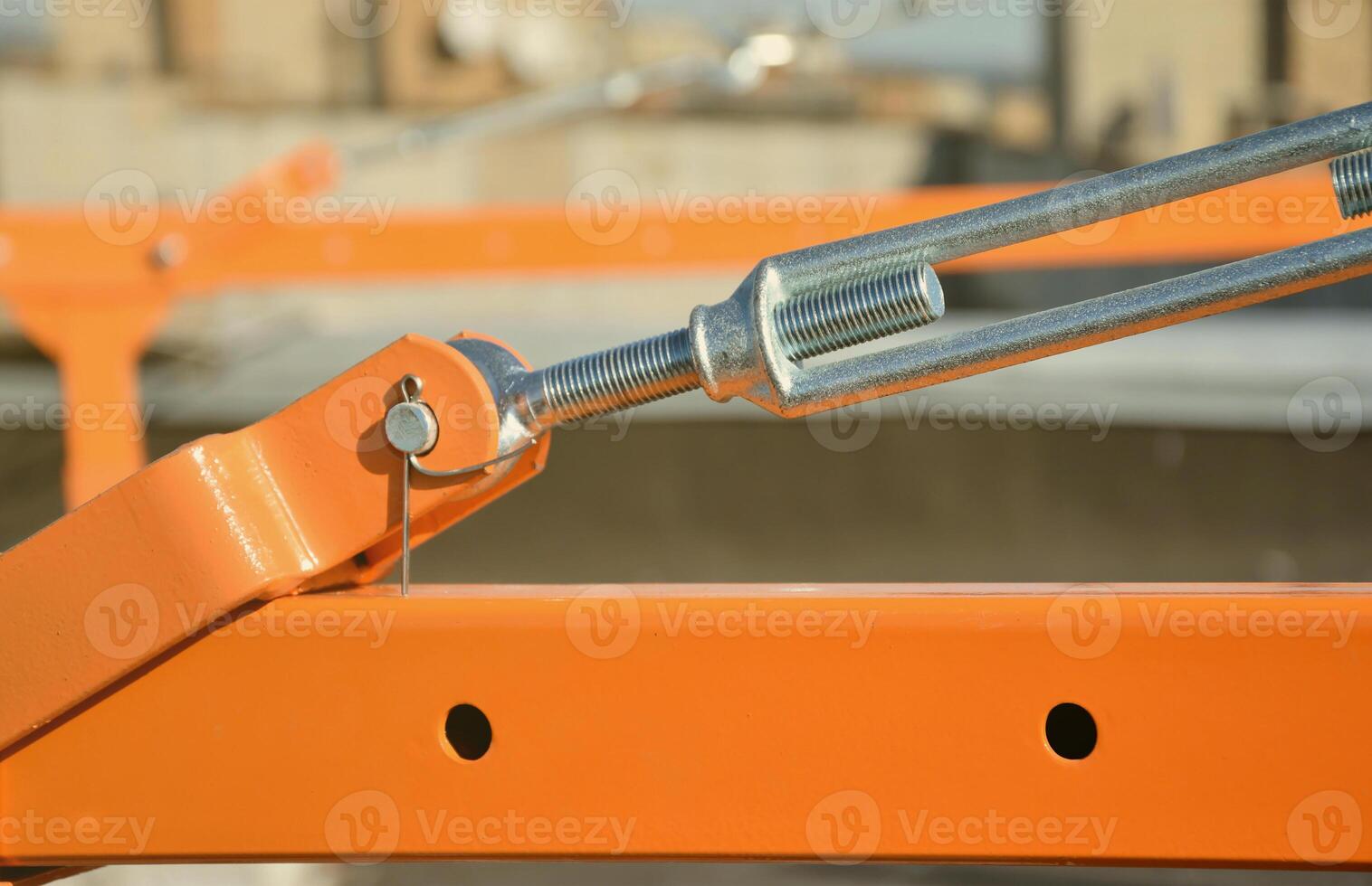 Rope lockers in rear beam of suspended wire rope platform for facade works on high multistorey buildings. Rope lockers blocks kink for safety platform usage photo