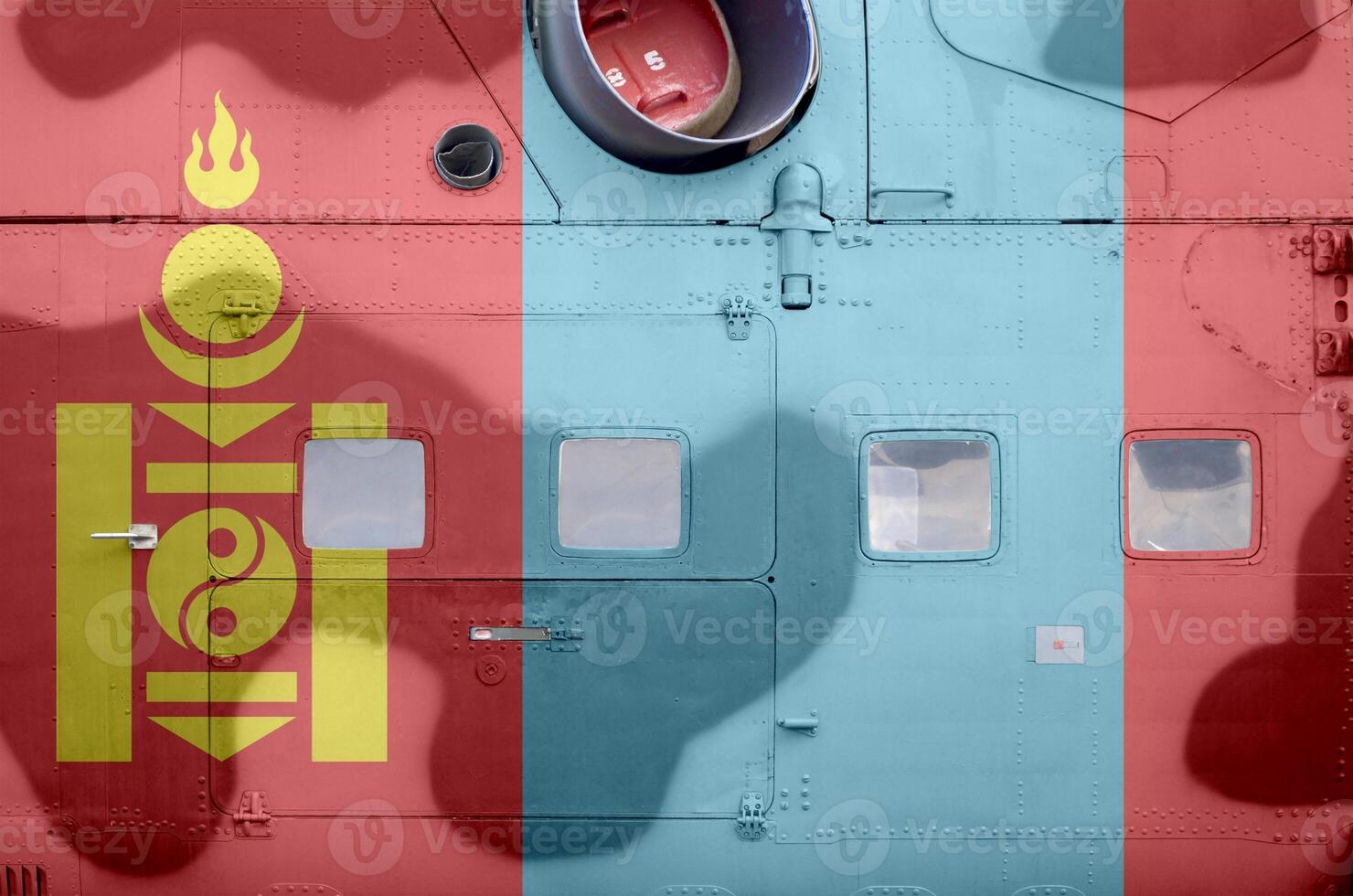 Mongolia flag depicted on side part of military armored helicopter closeup. Army forces aircraft conceptual background photo
