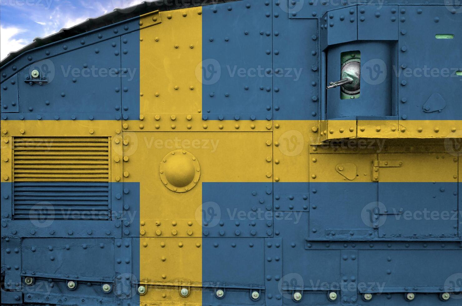 Sweden flag depicted on side part of military armored tank closeup. Army forces conceptual background photo