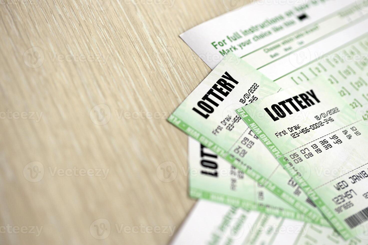 Green lottery tickets and blank bills with numbers for playing lottery photo