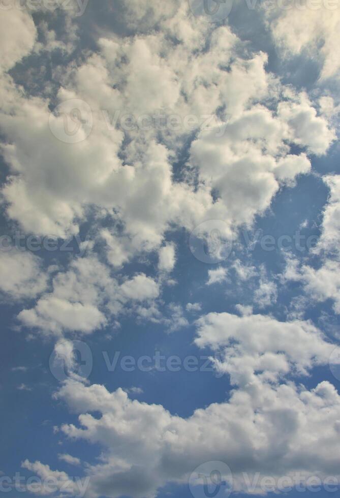 Beautiful blue sky background template with some space for input text message below isolated on blue photo