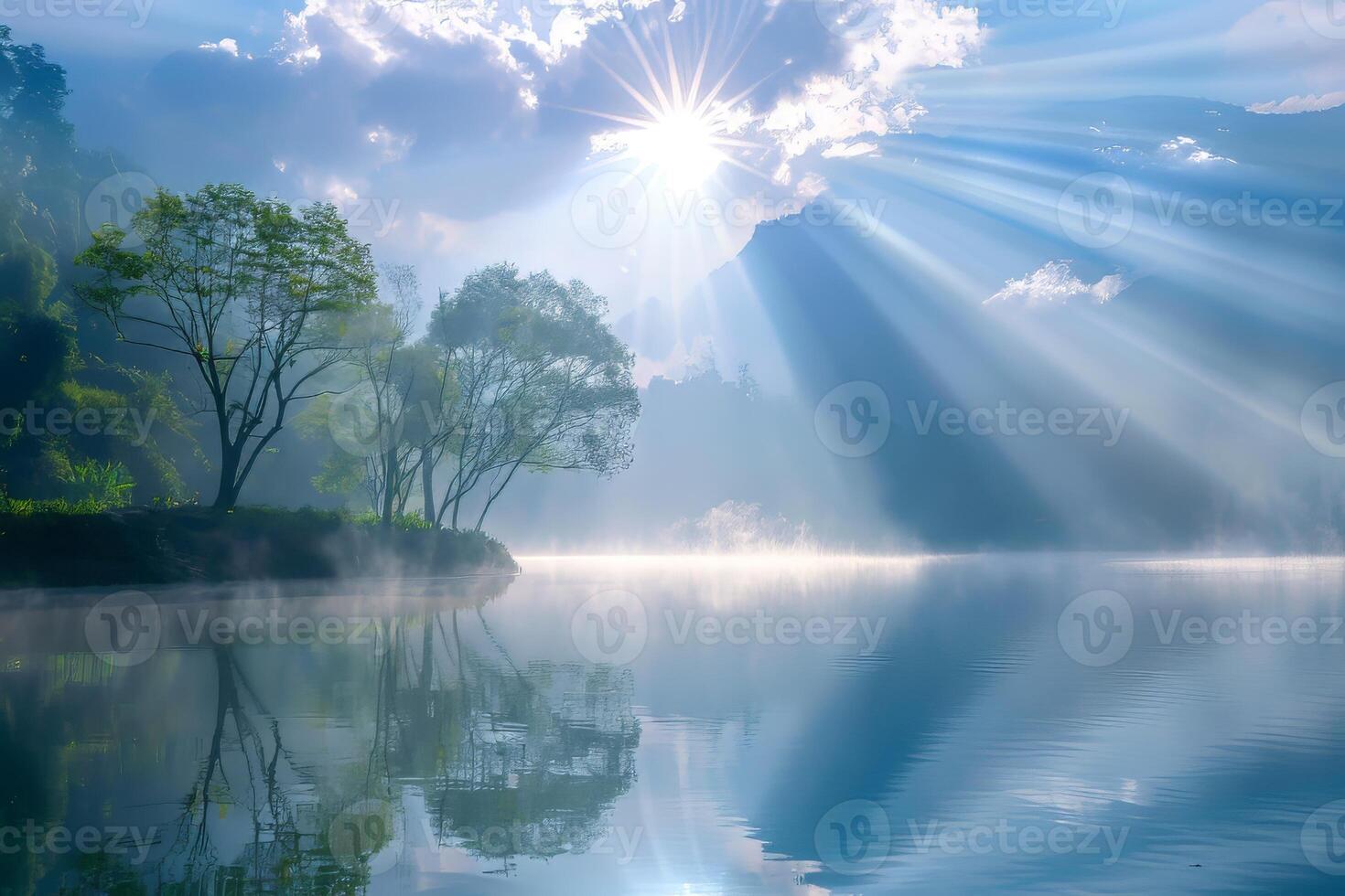 The sun is shining on the water, creating a beautiful reflection. The scene is peaceful and serene, with the trees in the background adding to the natural beauty of the landscape photo