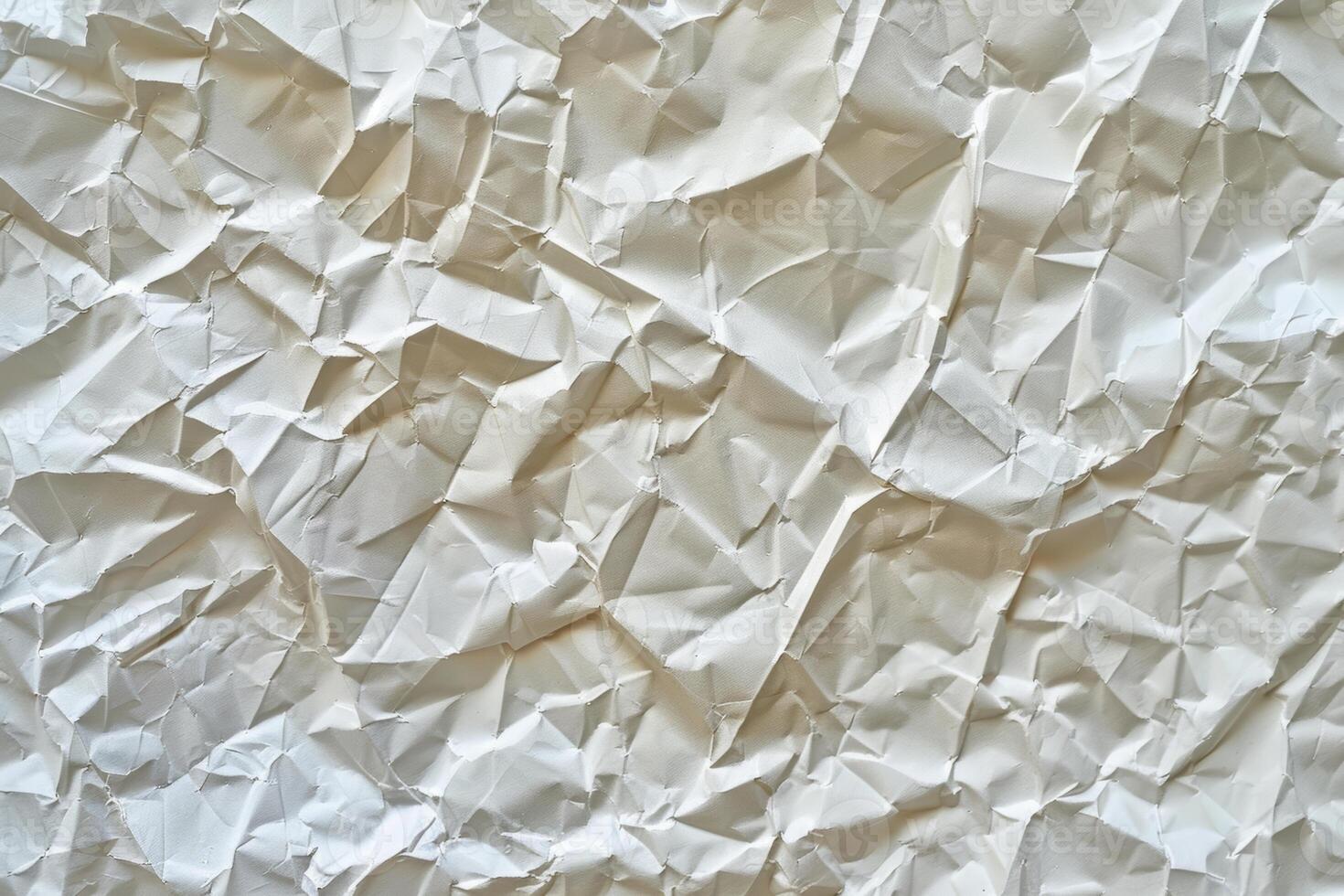 Seamless crumpled paper pattern with wrinkled and uneven surface photo