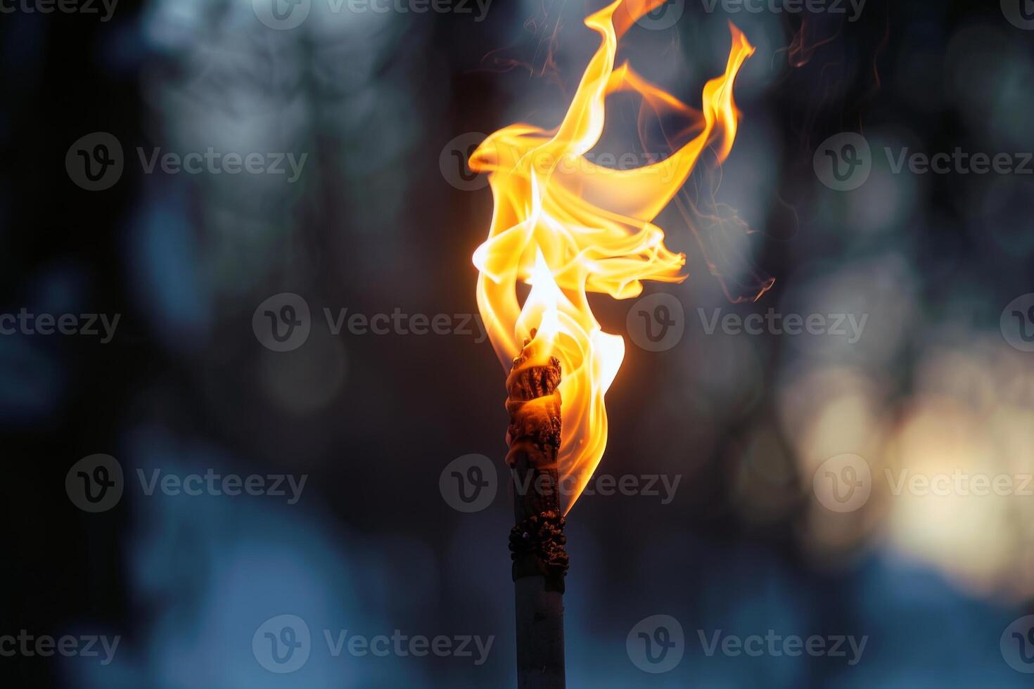 Bright torch flames illuminating the darkness against a transparent white surface, evoking images of adventure photo