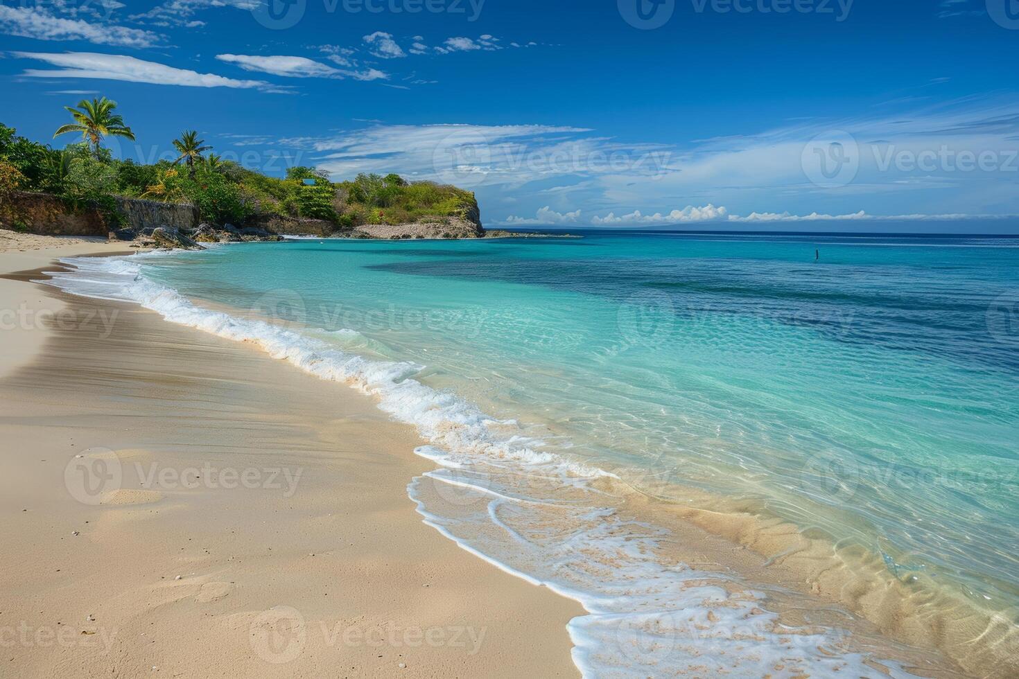A serene beach scene, with golden sand and turquoise waters photo