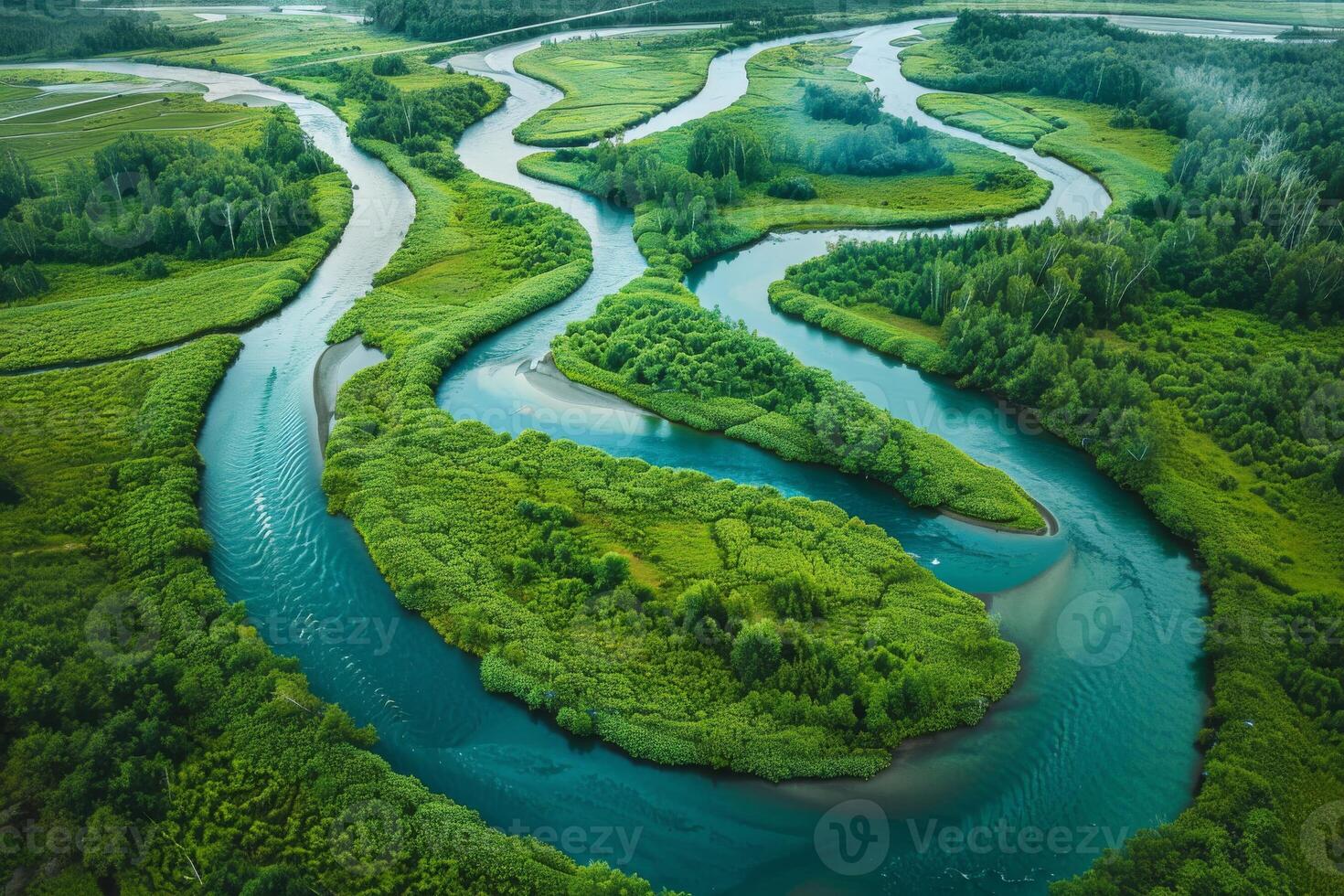 Aerial view of a meandering river through a pristine wilderness, emphasizing the importance of water conservation photo