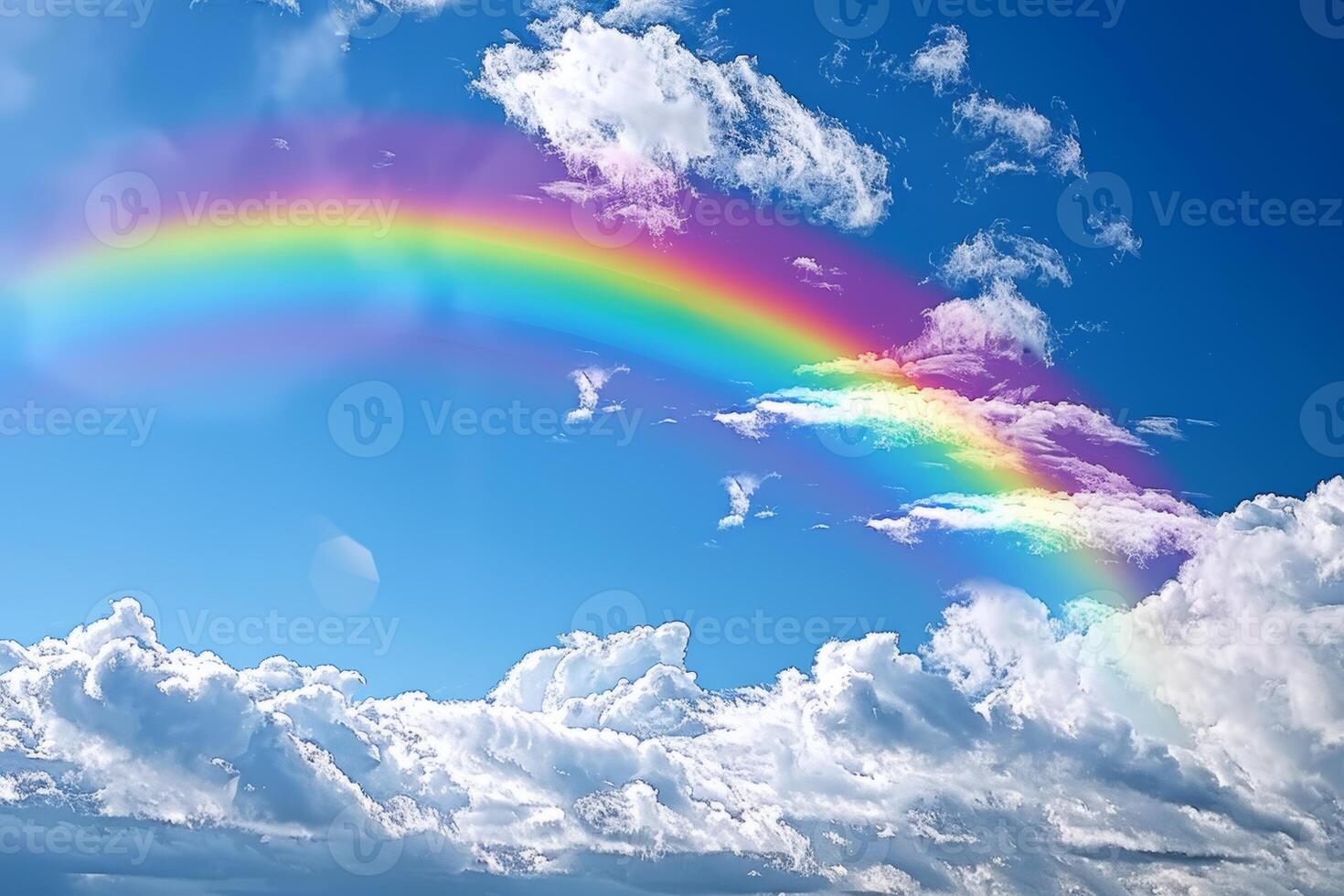 A vibrant rainbow arcing across the sky, with rain clouds parting to reveal blue skies beyond photo