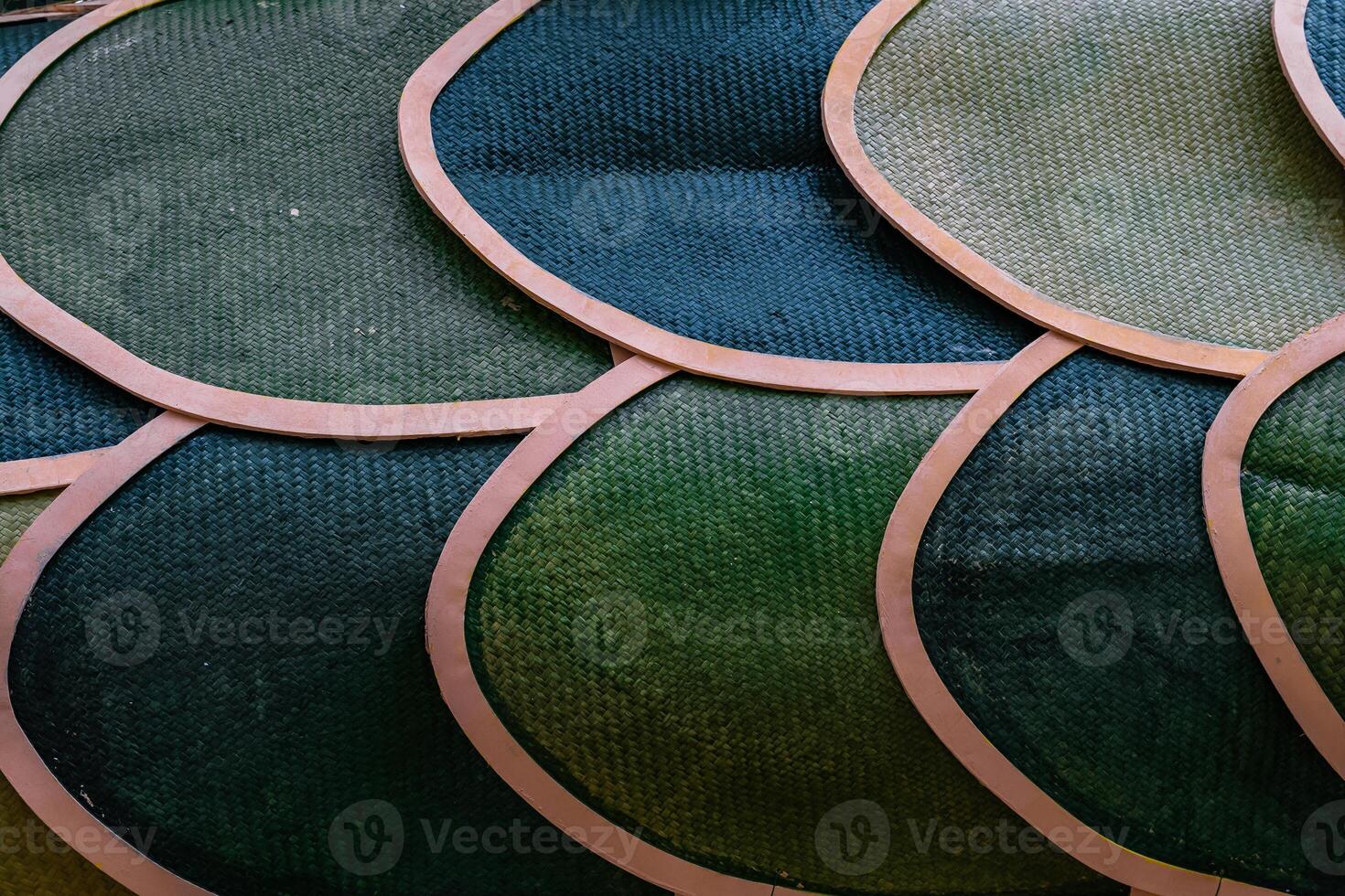 Green color Bamboo grass woven flat mat from natural bamboo background photo