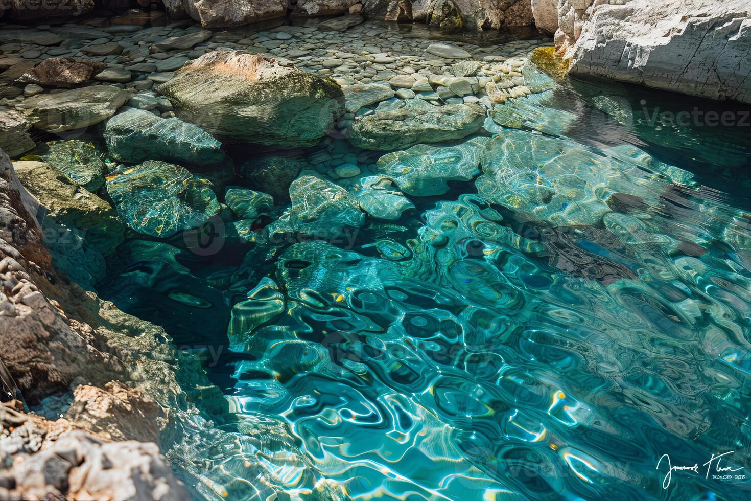 Crystal-clear water of a natural spring bubbling up from the ground photo