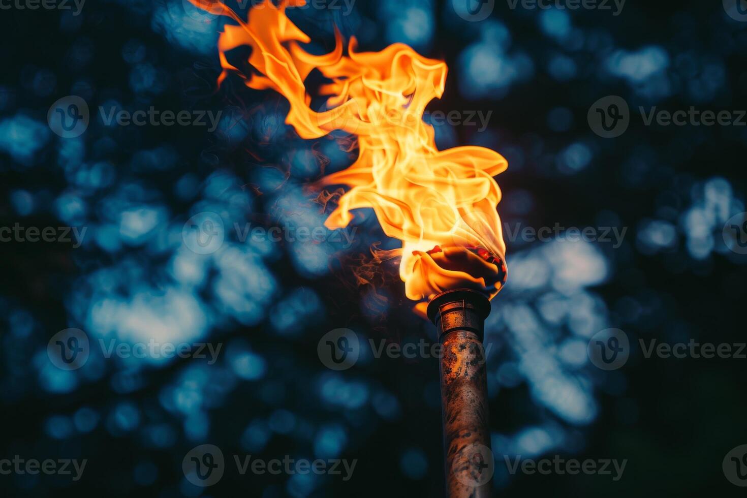 Bright torch flames illuminating the darkness against a transparent white surface, evoking images of adventure photo