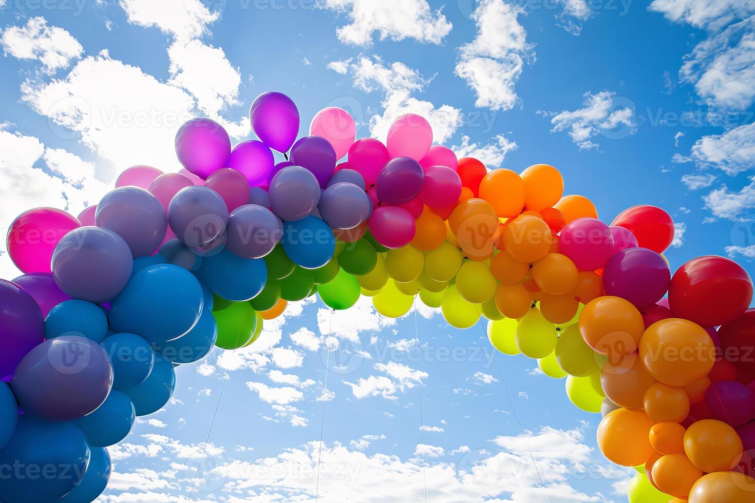 Colorful balloons arranged in the shape of a rainbow, symbolizing hope and positivity photo