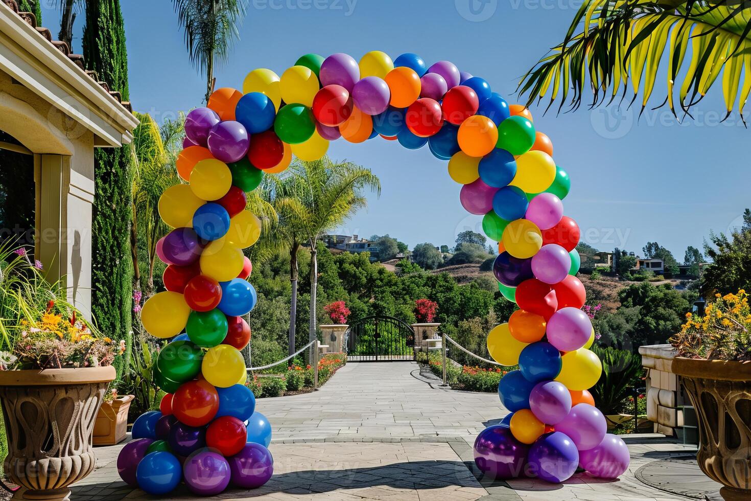 Colorful balloon arch framing a party entrance, inviting guests to celebrate photo