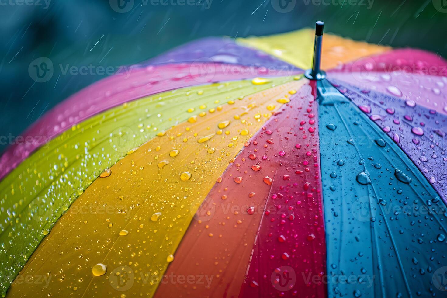 Rainbow-colored umbrella transparently shielding against raindrops on a cloudy day photo