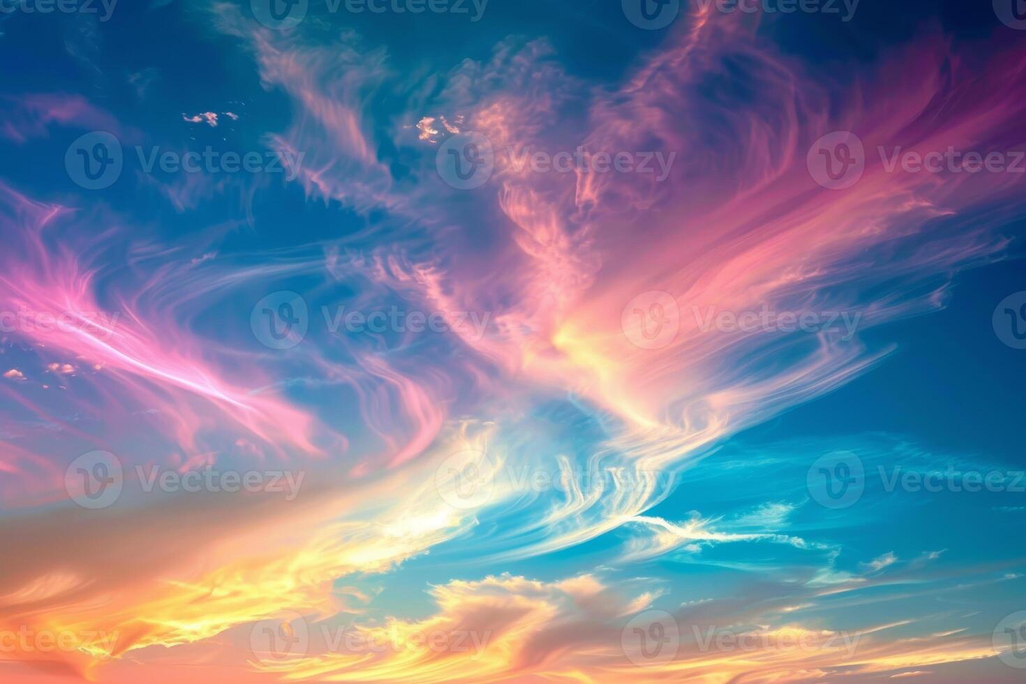 Wisps of cirrus clouds in a colorful sky photo