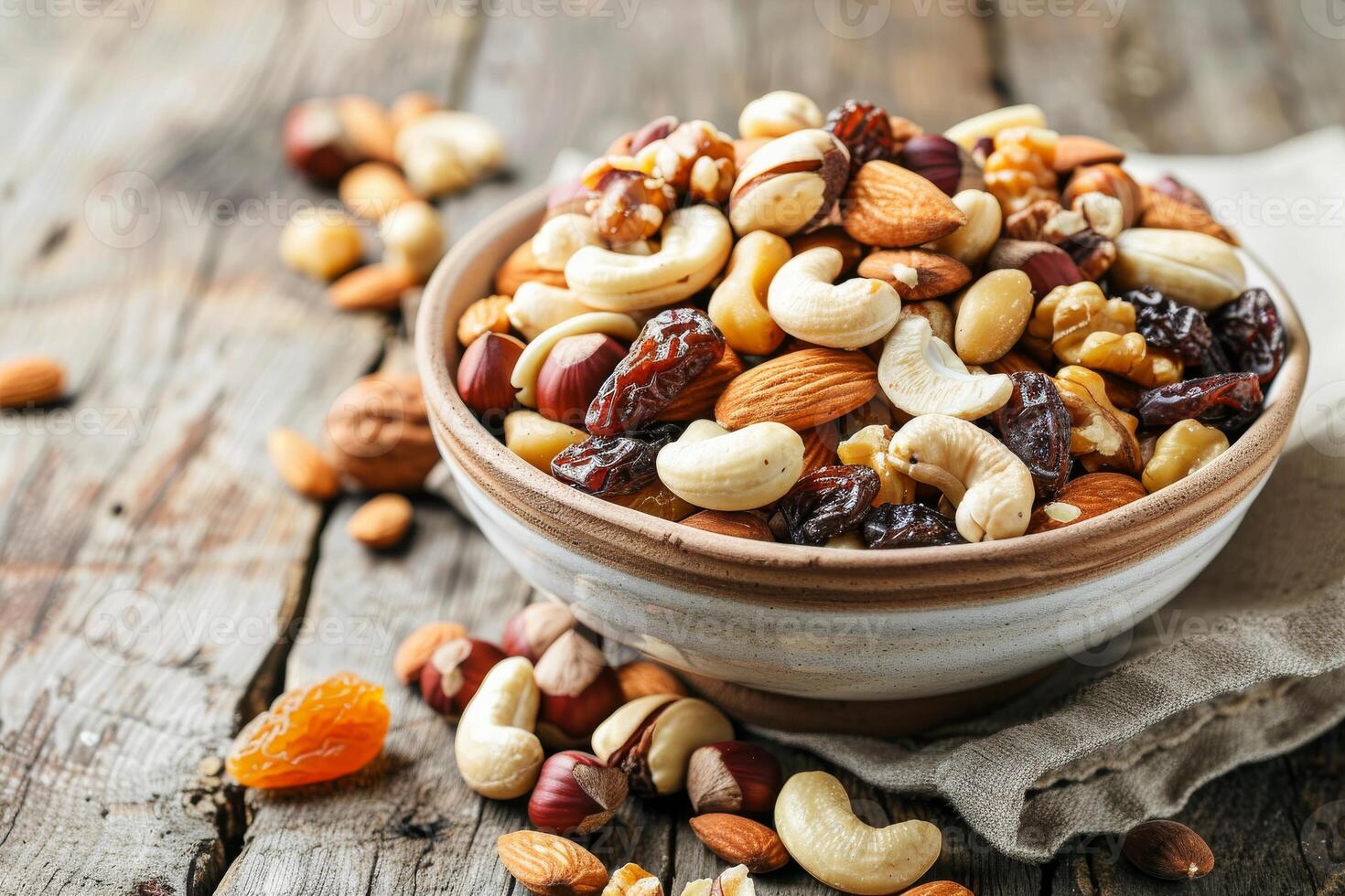Bowl of mixed nuts and dried fruits, a nutritious and satisfying snack photo