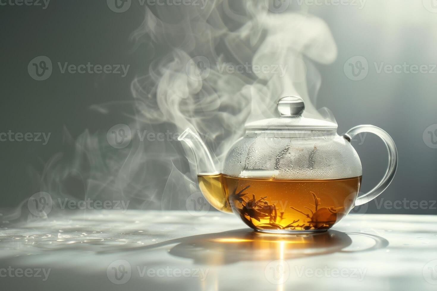 A tea kettle is sitting on a table with steam coming out of it. The steam is rising and creating a hazy atmosphere photo